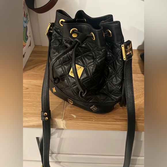 MCM Handbags - EUC MCM Authentic HERITAGE DRAWSTRING LEATHER CROSSBODY BAG